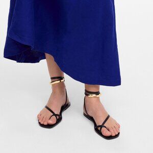 The Vira Bangle Ankle-Wrap Sandal in Leather - Cherry Wood and Gold